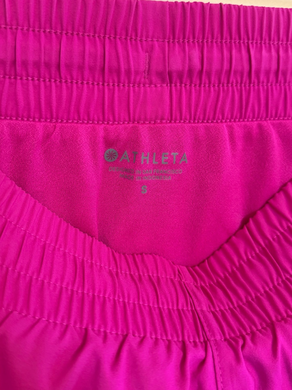 Athleta Mesh Racer Run Mid Rise Short in Magenta - Picture 9 of 10